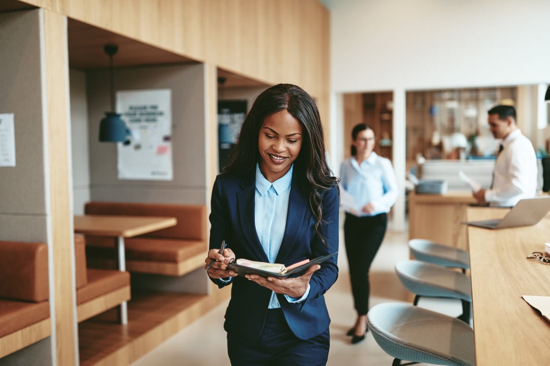 Businesswoman Walking through an Office